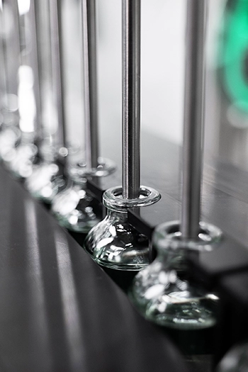 Precision vial filling in progress