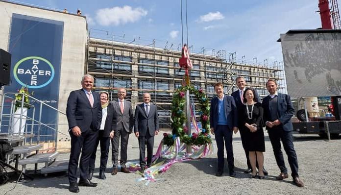 Topping-out ceremony for the world first AI-enhanced drug production facility